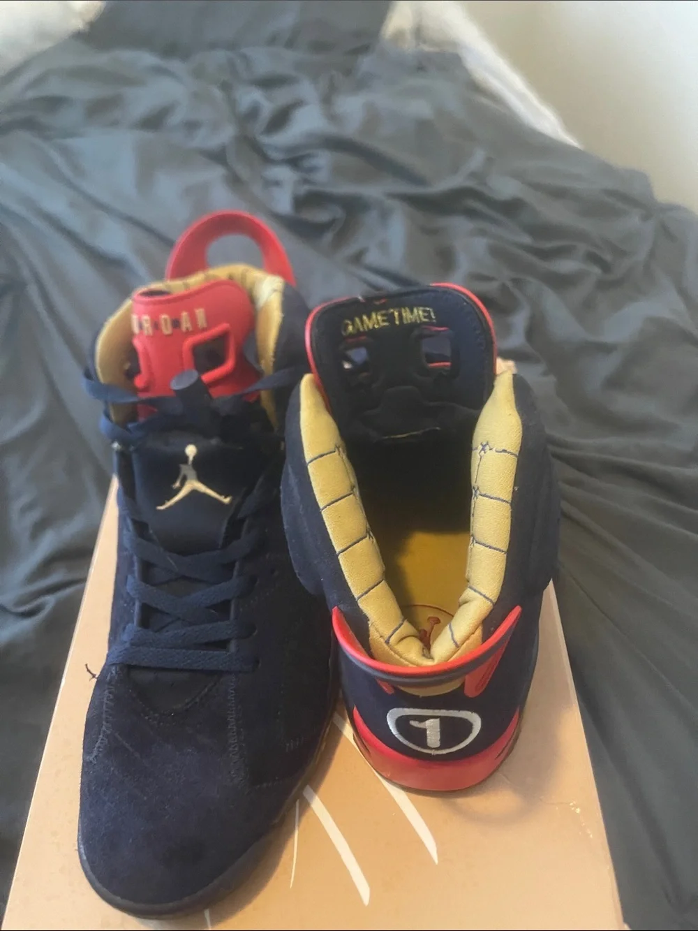 Jordan Men’s Athletic Shoes Navy Blue with Red and Gold Accents